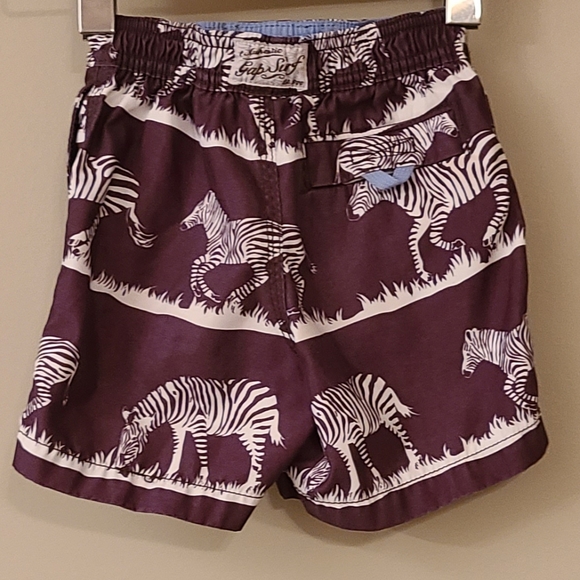 Brown zebra print mesh lined swim trunks - Picture 2 of 5